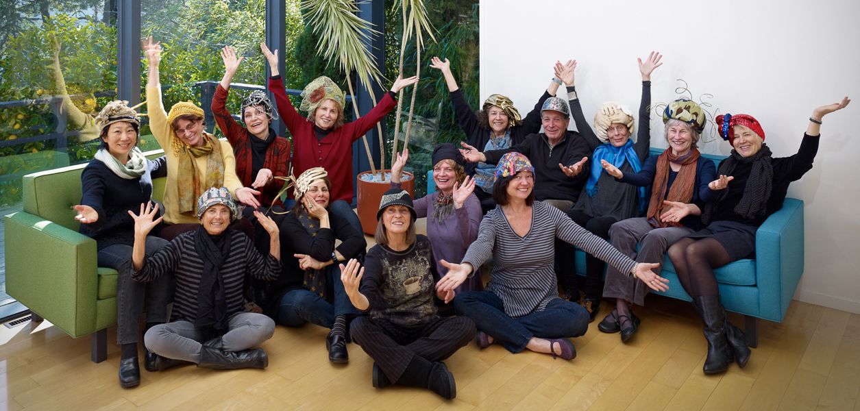 plexus art group with hats